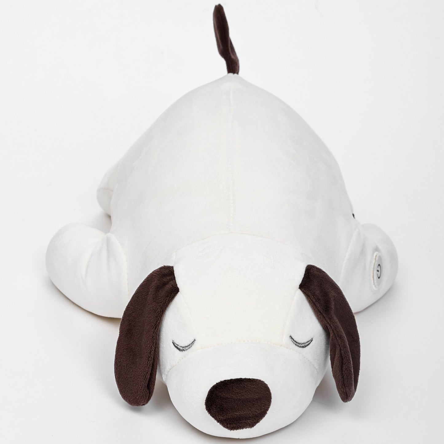 White plush dog toy with brown accents on a white background