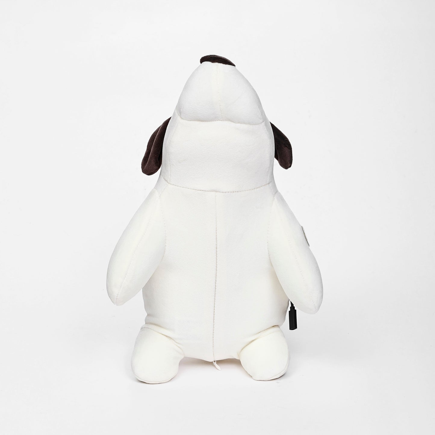 White plush toy with black accents on a white background